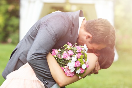 Beautiful wedding couple enjoying weddingの写真素材