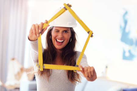 Mature woman doing home improvementsの写真素材