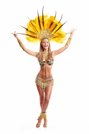 Brazilian woman posing in samba costume over white backgroundの写真素材