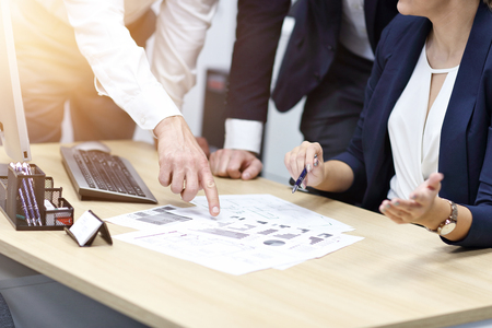Group of business people brainstorming their ideasの写真素材
