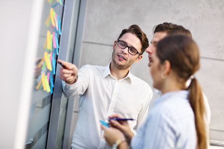 Group of business people brainstorming their ideas
