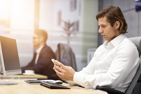 Close up portrait of businessman at workplace