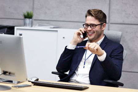 Close up portrait of businessman at workplaceの写真素材