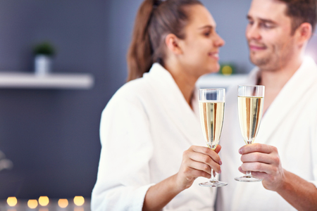 Adult happy couple relaxing in spa salonの写真素材