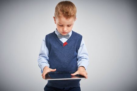 Picture of a boy posing over white backgroundの写真素材