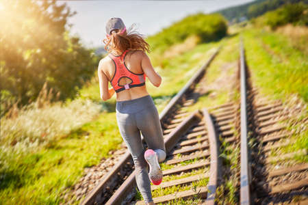Female jogger running in the countrysideの写真素材
