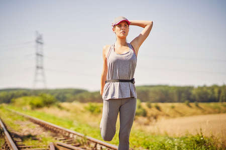 Female jogger running in the countryside