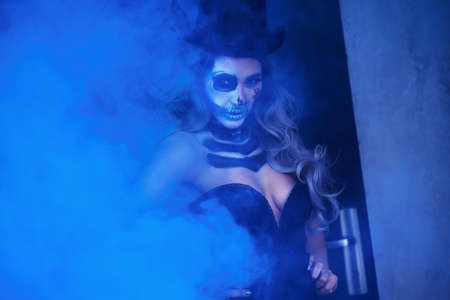 Spooky portrait of woman in halloween gotic makeupの写真素材