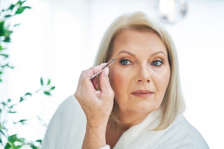 Senior woman in the bathroomの写真素材