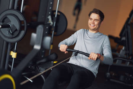 Adult man working out in a gym