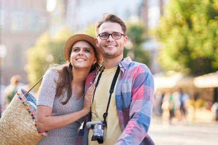 Happy tourists sightseeing during summer holidaysの写真素材