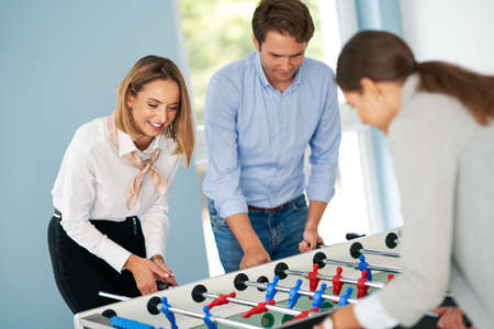 Business people relaxing in shared office space