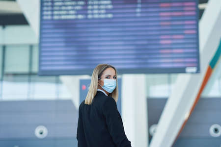 Adult female passenger at the airportの写真素材