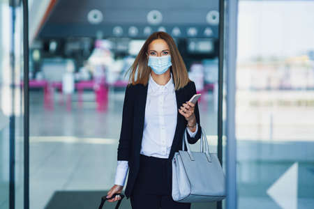 Adult female passenger at the airportの写真素材
