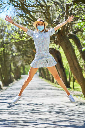 Woman jump in the park.
