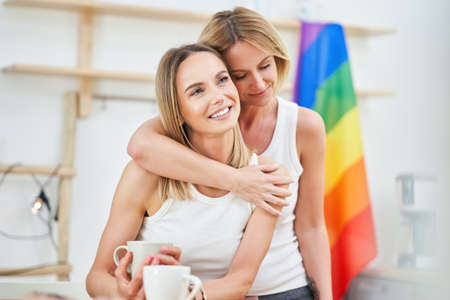 LGBT Lesbian couple love moments in the kitchen happiness conceptの写真素材