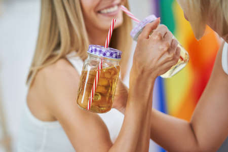 LGBT Lesbian couple love moments in the kitchen happiness concept