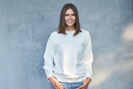 Young woman in white blouse