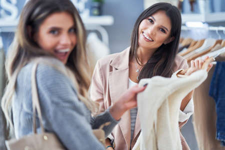 Group of happy friends during shoppingの写真素材