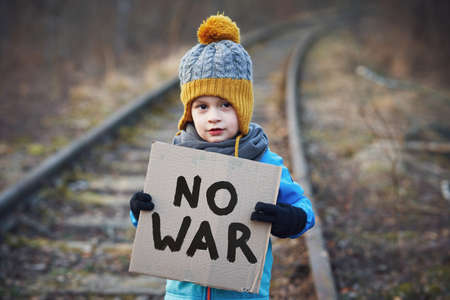 Picture of a child with a lot of love and peaceful messageの写真素材
