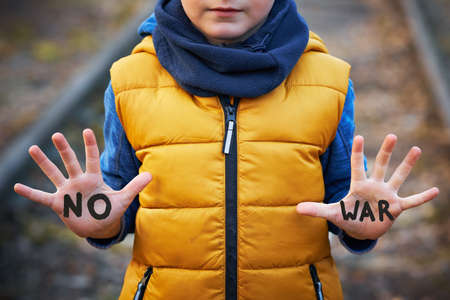 Picture of a child with a lot of love and peaceful messageの写真素材