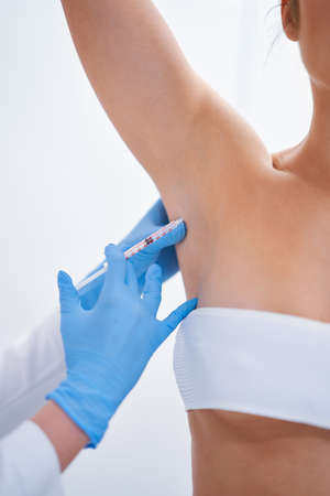 Picture of lipolysis treatment on different parts of woman bodyの写真素材