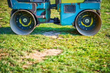 Picture of a road roller machine on the different surfaces
