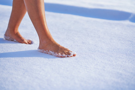 Picture of woman having fun on snow in winterの写真素材