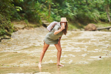 Photo of tourist woman in Gozalandia Waterfallsの写真素材