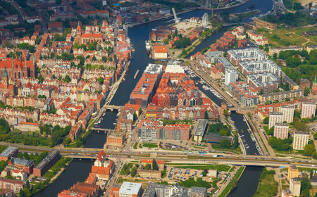 Stunning view of European Gdansk city with rivers, bridges, historical architecture, and modern...