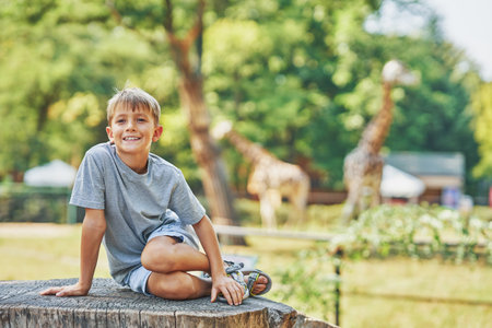 Photo of happy boy in the zooの写真素材