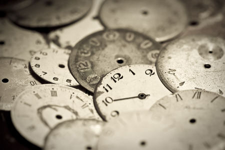 Horizontal top view of a set broken hand watchesの写真素材