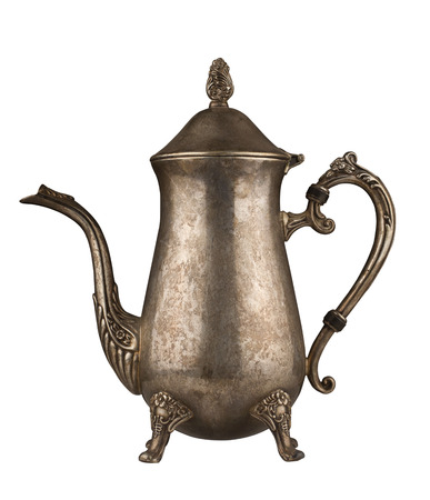 Silver vintage tea kettle with engravings isolated on white backgroundの写真素材