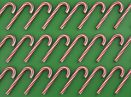 3d illustration top view of many red and white Christmas candy sticks bars on green background