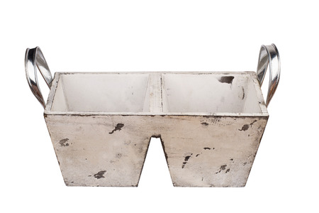 front view of empty wood vintage scratched and stained white flower vase with two compartments and metallic handlesの写真素材