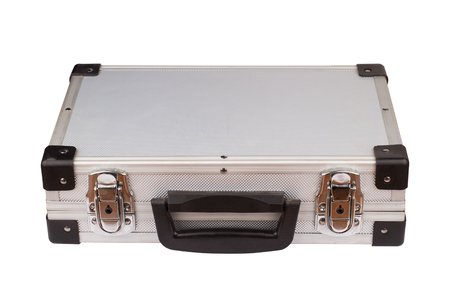 horizontal top view of closed silver metal aluminum suitcase isolated on white backgroundの写真素材