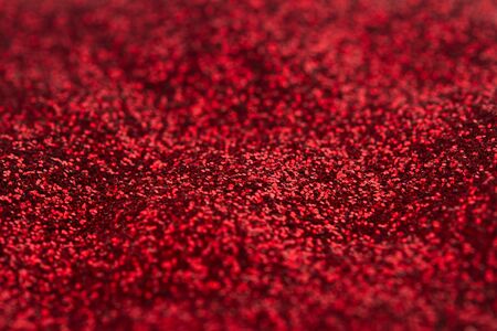 closeup of red glittering background texture の写真素材