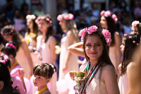 Kazanlak, Bulgaria - June 6, 2021: Young girls dressed in pink during the annual Kazanlak Rose...