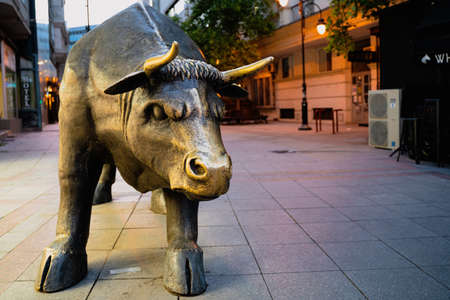 SKOPJE, NORTH MACEDONIA - AUGUST 19, 2021: Charging bull bronze statue near the central square of the cityのeditorial素材