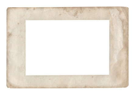 front view of vintage photo brown paper frame with stains isolated on white backgroundの写真素材