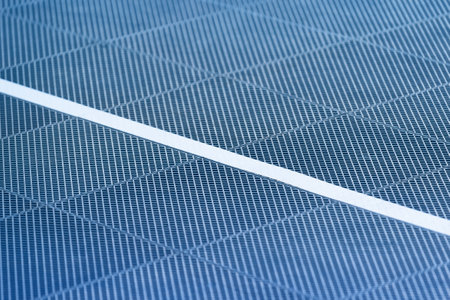 Detailed closeup of a blue textured surface with a white line running diagonally for a modern and minimal designの写真素材