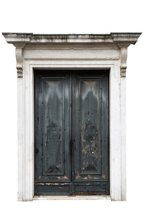 An ornate double wooden door with weathered paint set in a marble frame isolated on whiteの写真素材