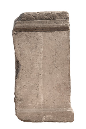 A weathered ancient stone artifact showcasing signs of age and history isolated on a white backgroundの写真素材