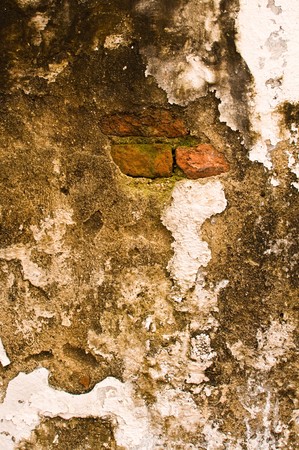 Close-up image of an old white concrete wallの写真素材