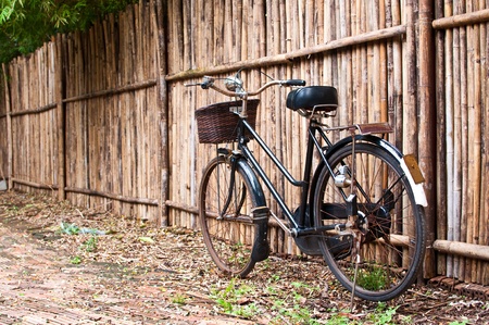 Old and classic bicycle with bamboo fentの写真素材