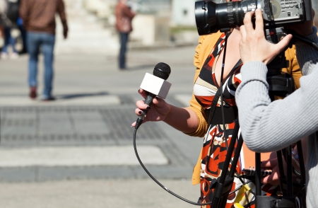 TV reporter interviewの写真素材