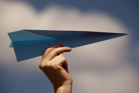 blue paper planeの写真素材