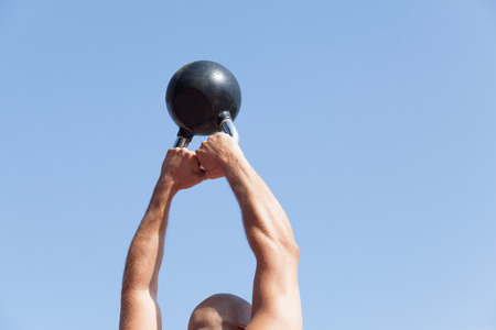 Exercising with a kettlebellの写真素材
