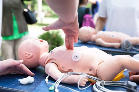 CPR and first aid class for a babyの写真素材