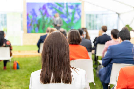 Audience at business presentation or professional conference